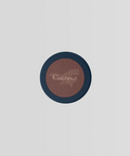 Round blush compact labeled 'Coconut' on a light gray background