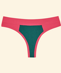 Pink and green bikini bottom on a beige background