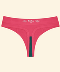 Pink thong with green waistband on a beige background
