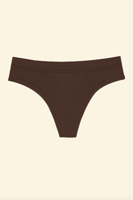 Brown thong on a beige background