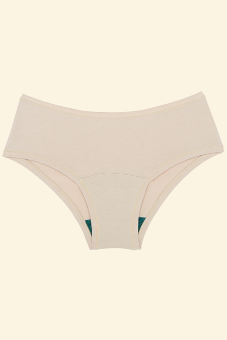 Beige high-waisted underwear on a light beige background