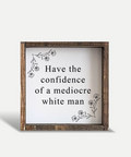Wooden framed sign with text on a white background