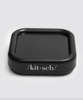 Black container with 'kitsch' branding on a light gray background