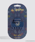 Blue claw clip with decorative element on a 'Harry Potter' branded packaging