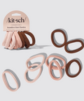 Kit-sch hair elastics in pink and brown on a light gray background