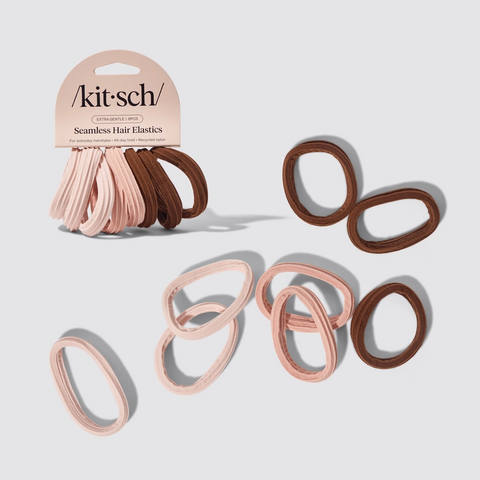Kit-sch hair elastics in pink and brown on a light gray background