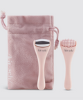 Pink skin care tool set with pouch on a light gray background