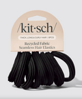 Pack of black hair elastics with 'kit&sch' branding on a light gray background