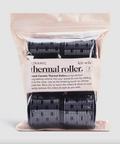 Packaged ceramic thermal rollers with clear plastic cover on a light gray background