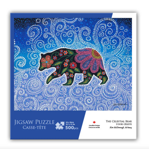 Jigsaw puzzle packaging with a bear design on a blue background