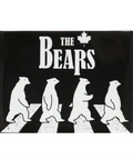 Stylized image of bears crossing a road with 'The Bears' text and a maple leaf symbol on a black background.
