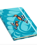 Blue notebook with bird design on a white background