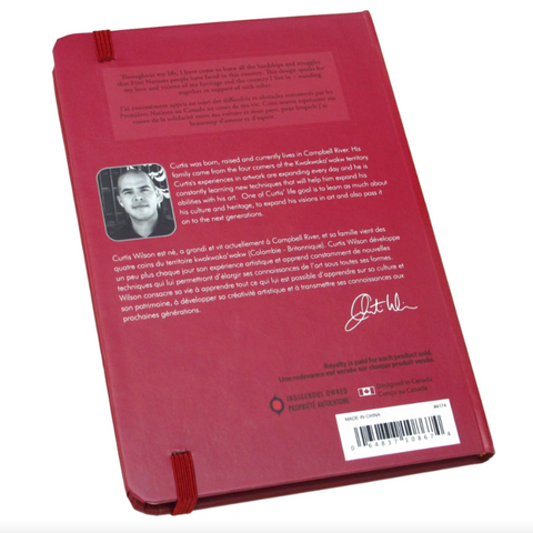 Red notebook with a barcode and text on a white background