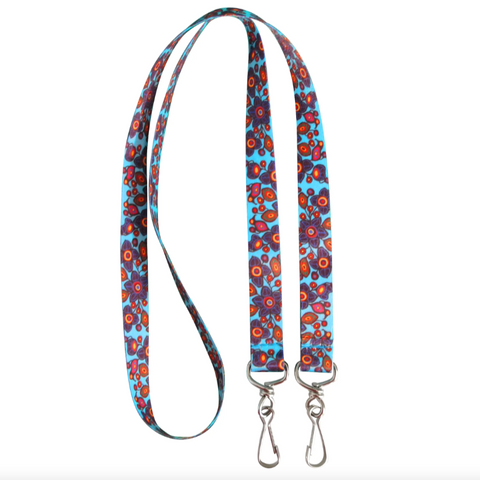 Floral patterned lanyard with metal clasps on a white background