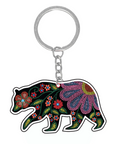 Keychain with a bear design featuring flowers on a white background