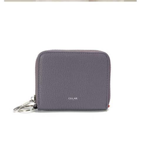 Gray wallet with a keychain on a white background