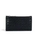 Black quilted clutch bag on a white background with vegan certification logo.