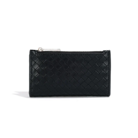 Black quilted clutch bag on a white background with vegan certification logo.