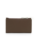 Brown leather pouch with a zipper on a white background, featuring a vegan label.