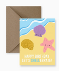 Birthday card with sea-themed illustrations and envelope on a computer screen
