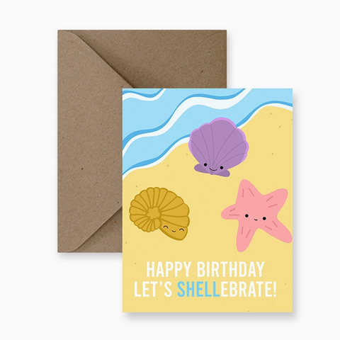 Birthday card with sea-themed illustrations and envelope on a computer screen
