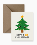 Christmas card with a tree design and envelope on a white background