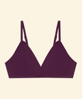 Purple bralette on a beige background