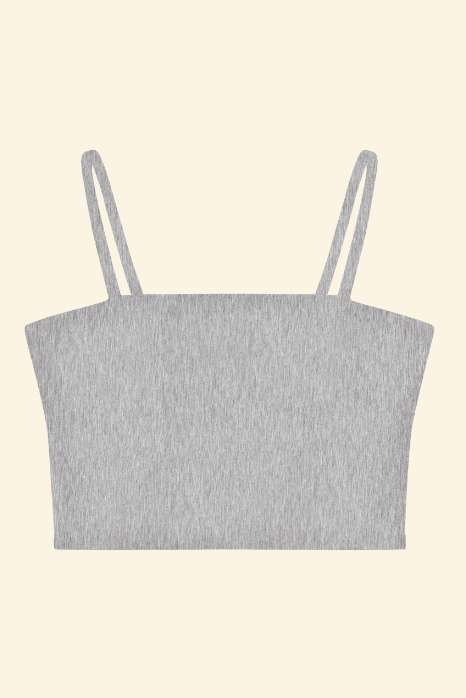 Gray crop top with thin straps on a beige background