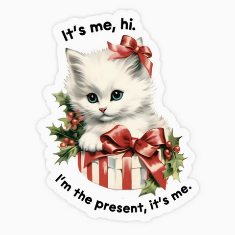Sticker with a kitten and gift box design on a computer screen