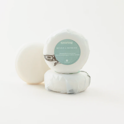 Two soaps with a label on a white background