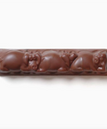 Chocolate bar with bear designs on a white background