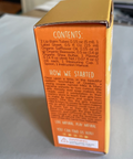 Orange box with text on a white surface