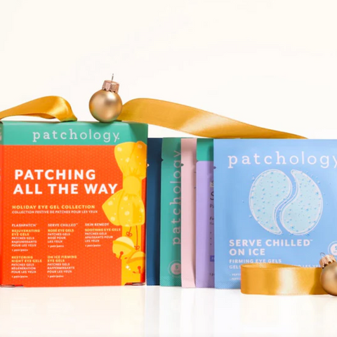 Patchology product packaging with colorful boxes and gold ribbons on a white background