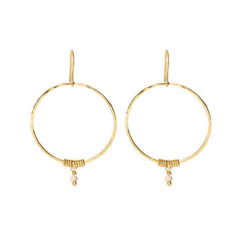 Gold hoop earrings with small beads on a white background