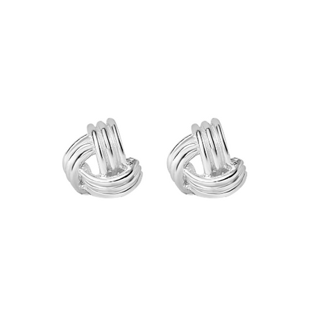 Pair of silver knot earrings on a white background
