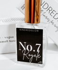 Perfume bottle labeled 'No. 7 Royale' by Kindredglow on a white background