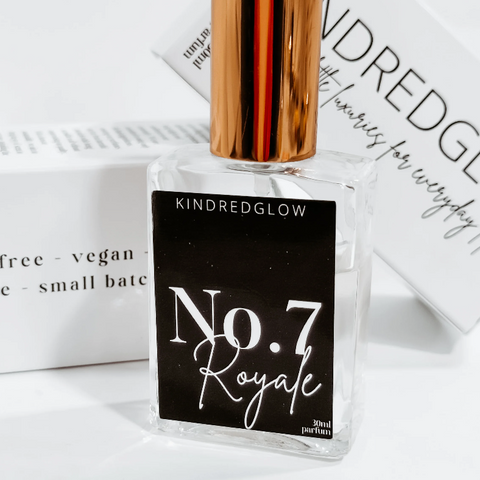 Perfume bottle labeled 'No. 7 Royale' by Kindredglow on a white background