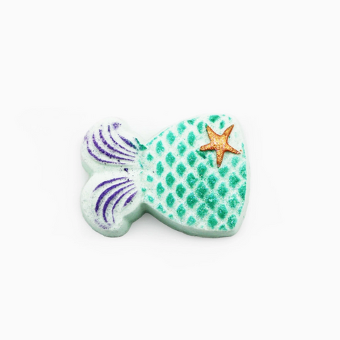 Decorative fish-shaped object with a star on a white background