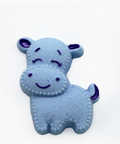 Blue hippo toy with purple accents on a white background