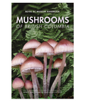 Book cover of 'Mushrooms of British Columbia' with mushrooms and ferns on a white background