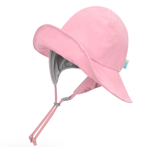 Pink baby sun hat with a strap on a white background