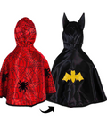 Two children's hooded cape costumes shown side by side on a white background: a red spider-themed cape with black web pattern and spider motifs, and a black bat-themed cape with a yellow bat emblem. No person, animal, or real environment is present, so this is Product/Packaging.
