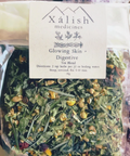 Packaging of 'Glowing Skin & Digestive Tea' by Xalish Medicines displaying the herbs contained within such as Balsam Fir, Rosehips, Lemon Balm, and Chamomile.
