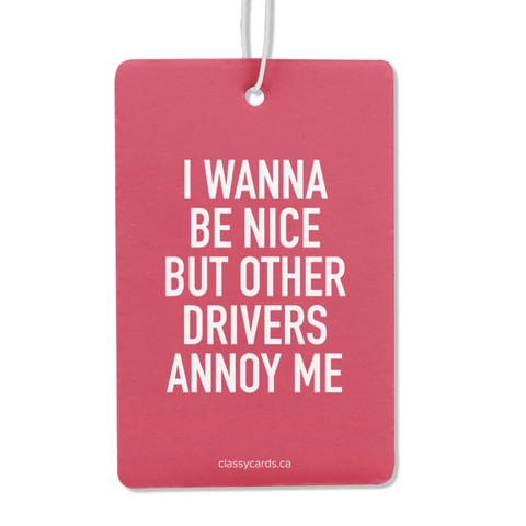 Pink card with white text 'I WANNA BE NICE BUT OTHER DRIVERS ANNOY ME' on a white background