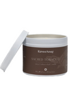 Candle jar labeled 'Raven Song Sacred Tobacco' on a white background