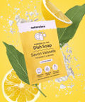 Naturebee dish soap packet with lemon slices and leaves on a yellow background
