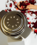Tea infuser with brand name on a white background