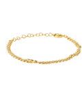 Gold bracelet on a white background