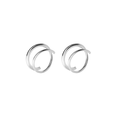 Pair of silver spiral earrings on a white background
