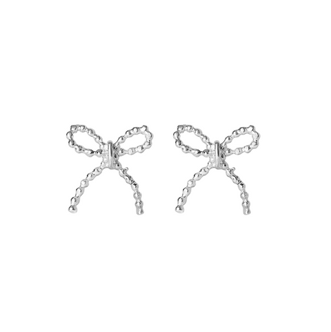 Silver bow-shaped earrings on a white background